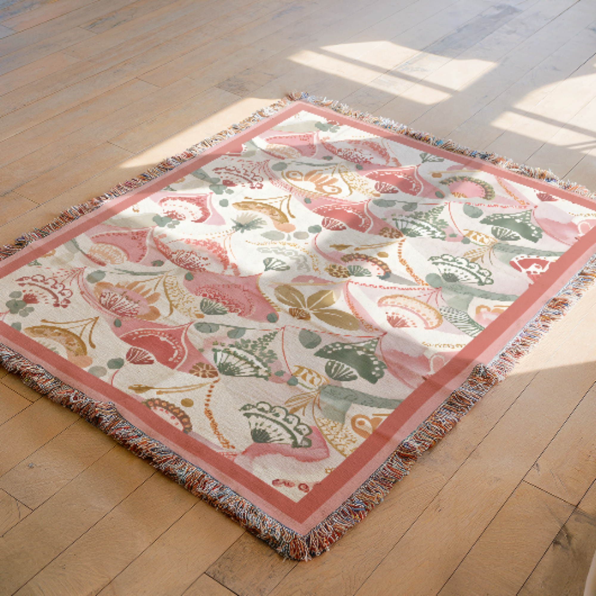 pink tapestry boho with floral pattern on a wooden floor