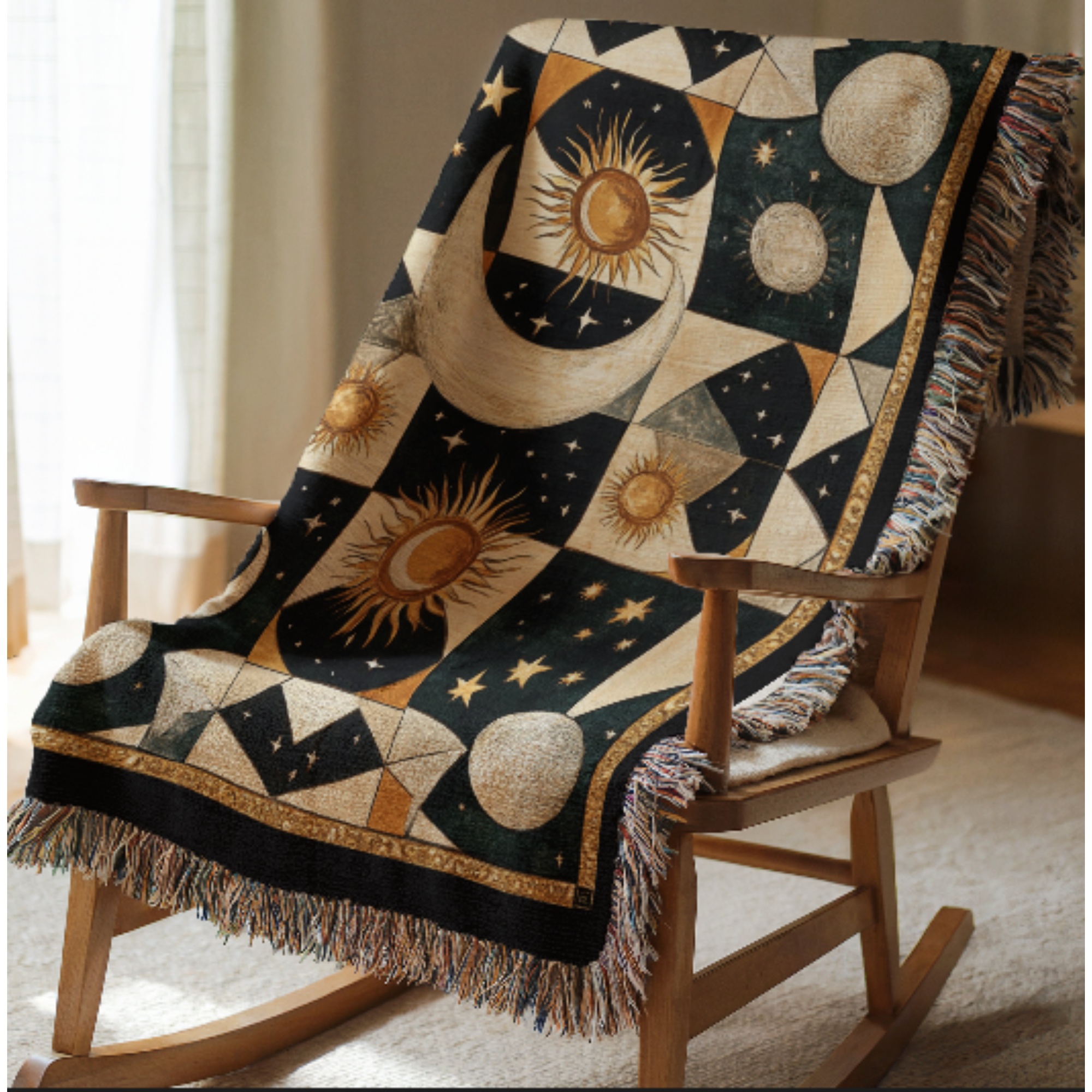 Decorative woven blanket with celestial design draped over a wooden rocking chair.